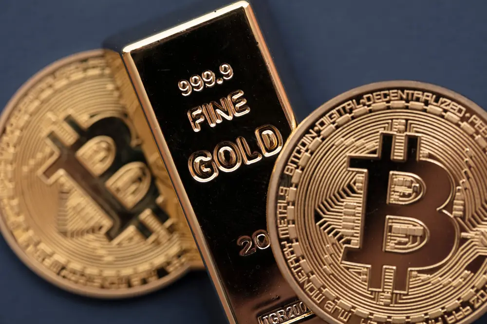 Bitcoin ETFs are not competing with gold as the precious metal holds above $2,000 teaser image