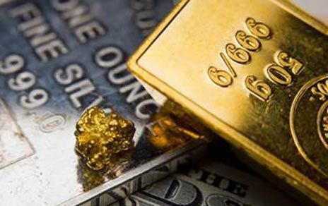 Spot gold lower, silver strong as traders assess global data, central bank outlook teaser image